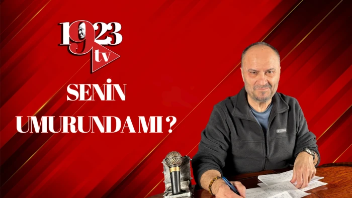 SENİN UMURUNDA  MI?